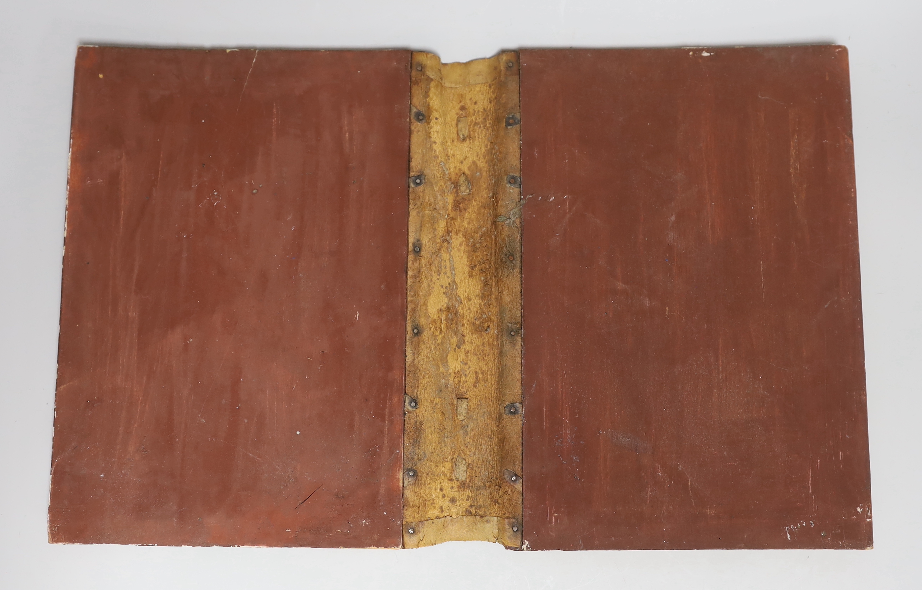 An 18th century European gilt and painted book cover, 29x21cm